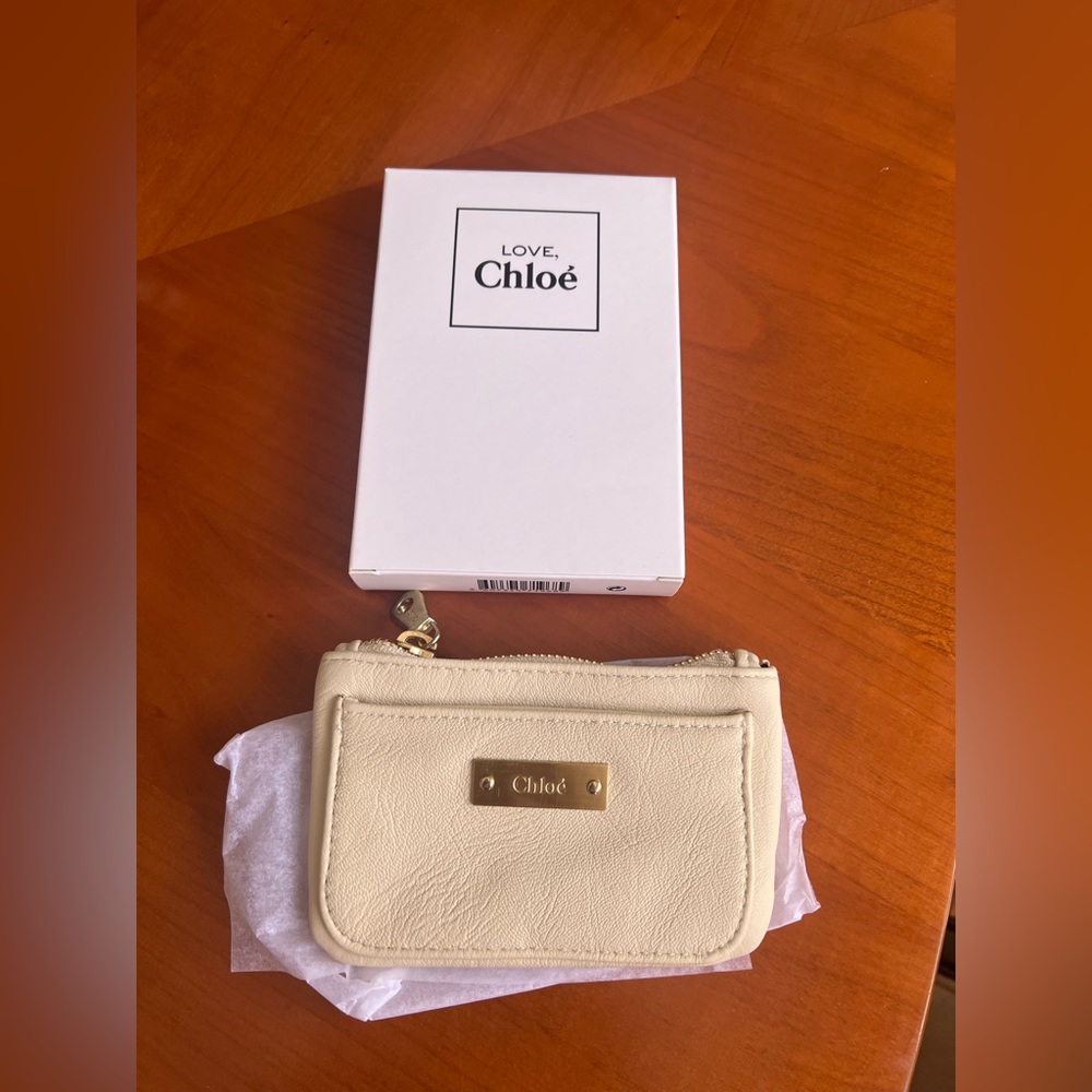 Love Chloe coin pouch.  Brand new